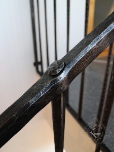 Detajl kovane stopniščne ograje